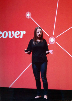 laura_speaking_on_stage_at_discover